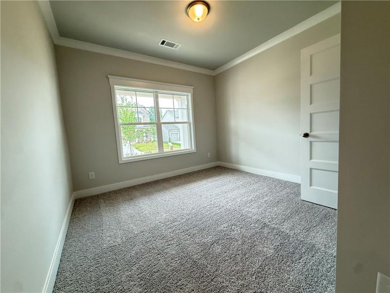 Spacious, unfurnished interior of a new home in Ponderosa Farms Manor, Gainesville (Image 31).