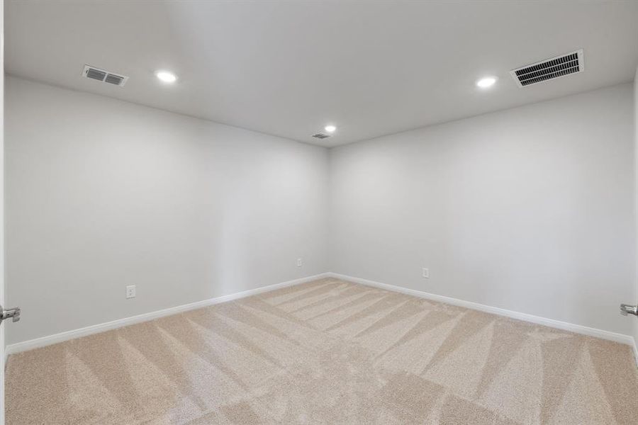 The upstairs media room, paired with a spacious game room creates the ultimate family entertainment area!