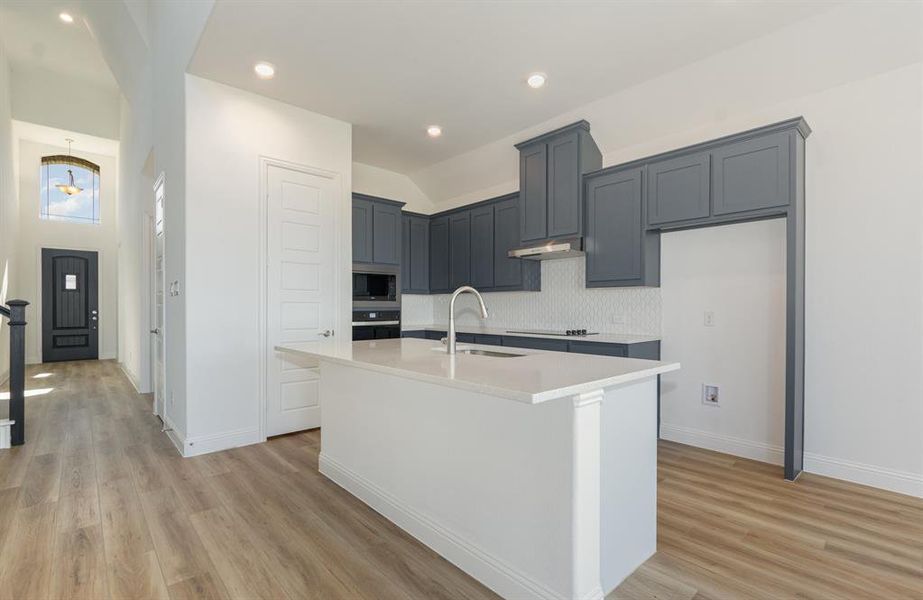 Furnished interior view inside a new home in Stone Henge II, Sanger (Image 8).