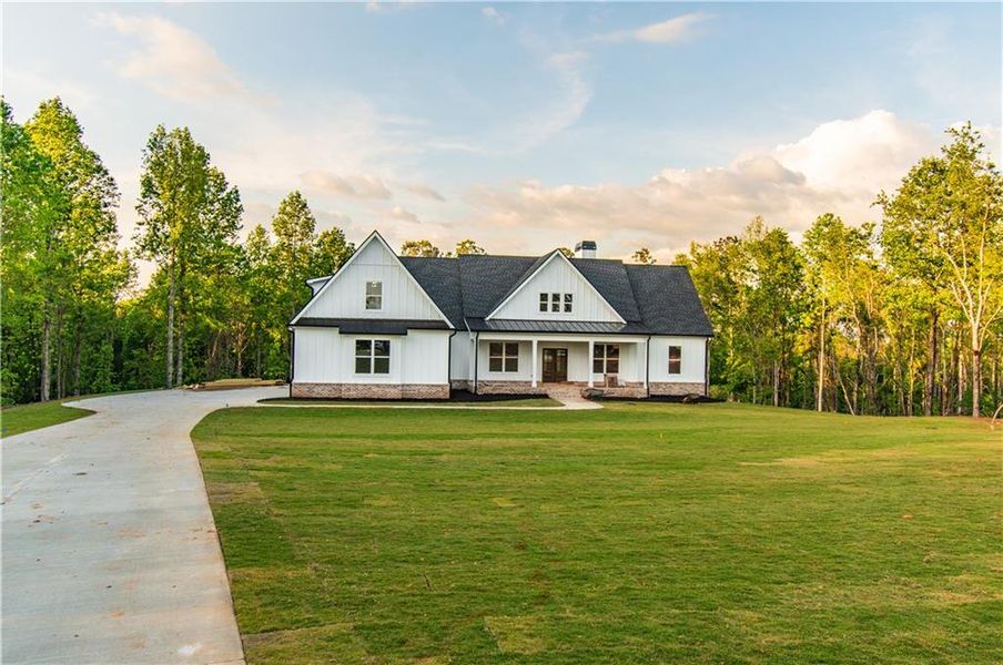 Front exterior of a new home in , Fairmount, GA, highlighting curb appeal (Image 14).