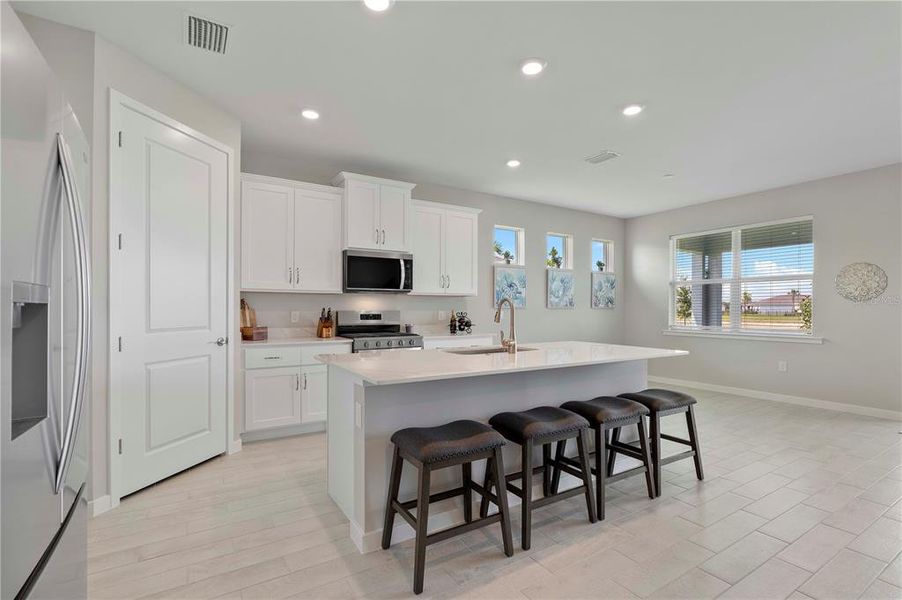 Furnished interior view inside a new home in Palmetto Landing at Babcock Ranch - Tradition, Punta Gorda (Image 33).