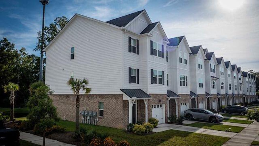 Front exterior of a new home in , Summerville, SC, highlighting curb appeal (Image 14).