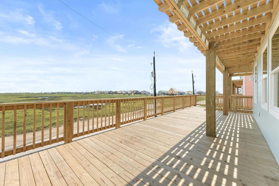 Partially shaded, spacious deck with long-range views of the wetlands, ICW, beach, and bay. Partially shaded, spacious deck with long-range views of the wetlands, ICW, beach, and bay.