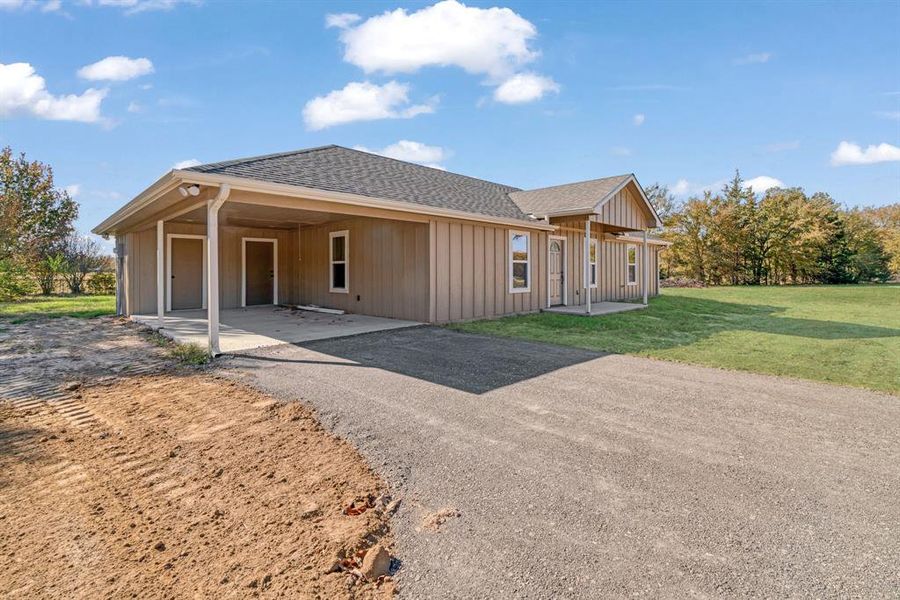 Exterior details and patio area of a home in , Powderly (Image 12).