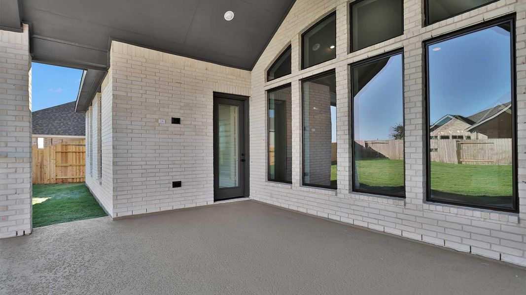 Exterior details and patio area of a home in Valencia 70', Manvel (Image 3). Exterior details and patio area of a home in Valencia 70', Manvel (Image 3).