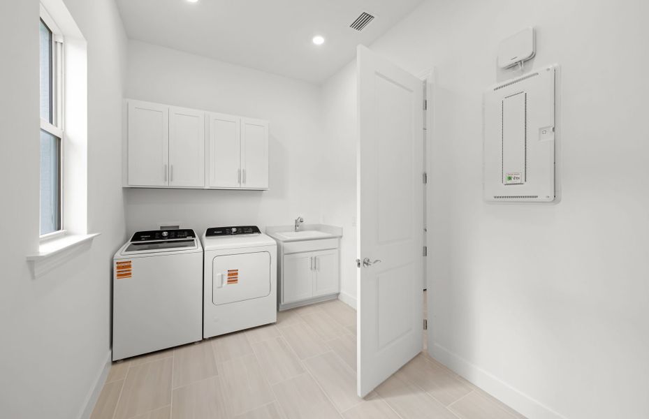 Furnished interior view inside a new home in TerraWalk at Babcock Ranch, Alva (Image 6).