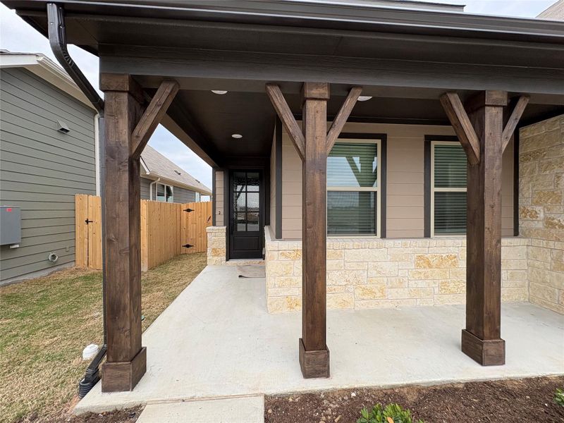 Exterior details and patio area of a home in Willow Springs, Buda (Image 3).