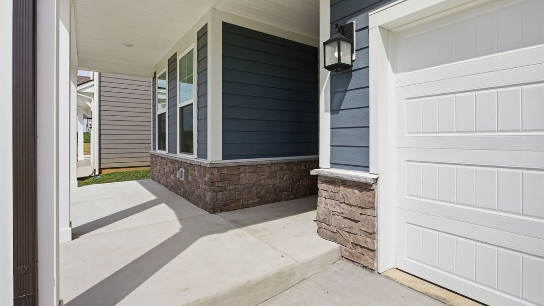 Covered entry with porch light Covered entry with porch light