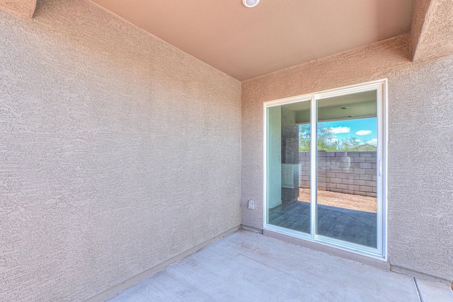 A room with a window and a door. A room with a window and a door.