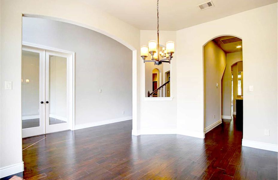 Representative unfurnished interior of a home built from the 4198 by Ravenna Homes in The Woodlands Hills 65′, Willis (Image 16).