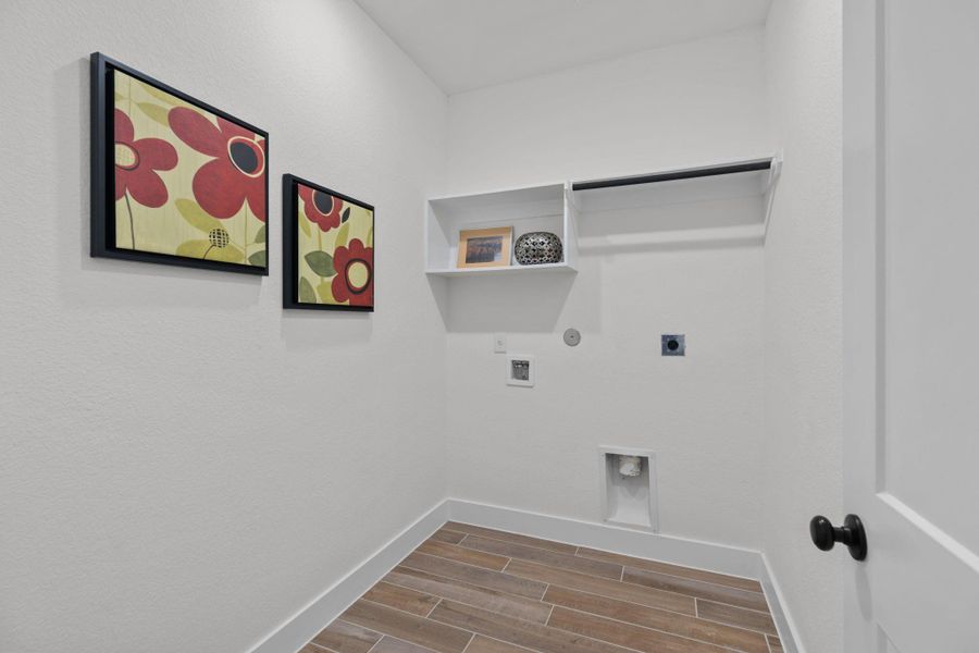 Nice laundry room located inside the home.
