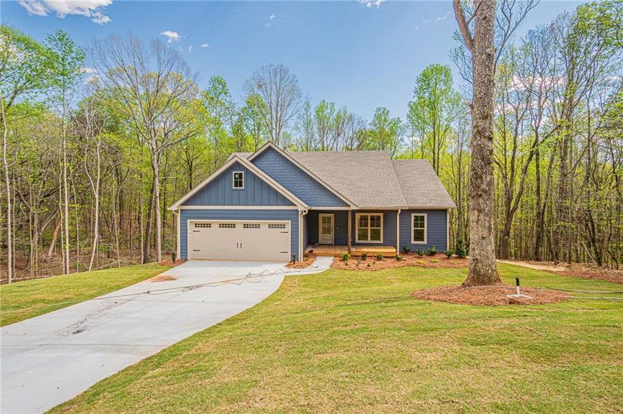 Front exterior of a new home in , Murrayville, GA, highlighting curb appeal (Image 29).