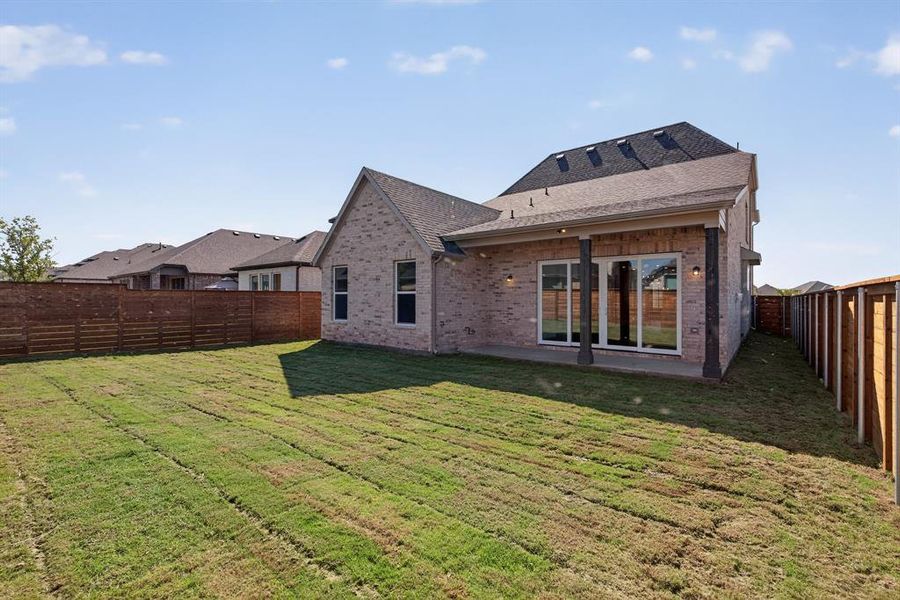 Exterior details and patio area of a home in Solterra, Mesquite (Image 2).