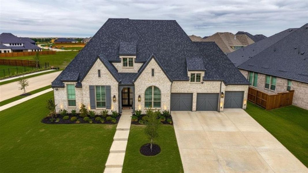 Front exterior of a new home in , Celina, TX, highlighting curb appeal (Image 22).