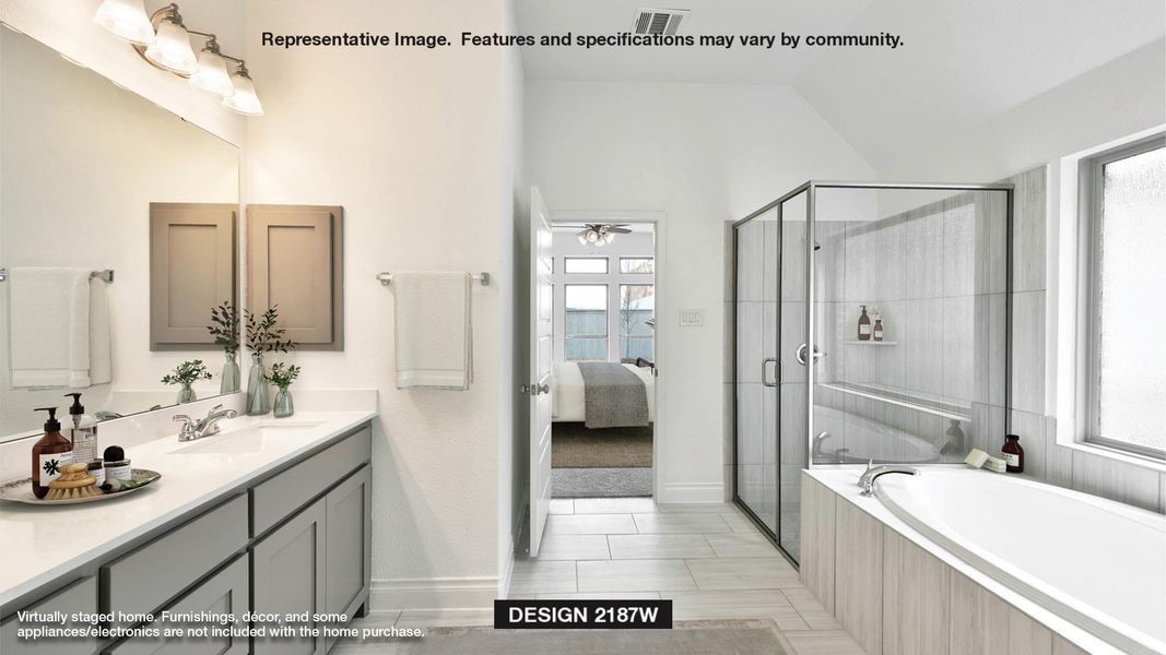 Bathroom with ceiling fan, tile patterned floors, vanity, and independent shower and bath