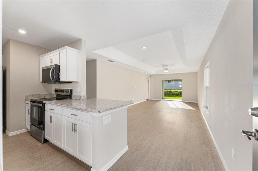 Furnished interior view inside a new home in , Floral City (Image 9).