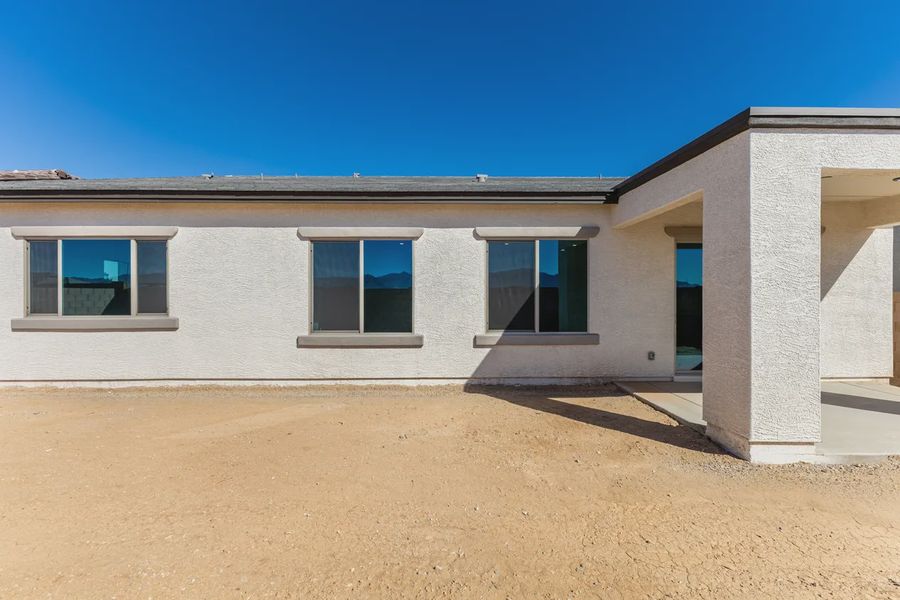 Exterior details and patio area of a home in Valencia at Granite Vista, Waddell (Image 23).
