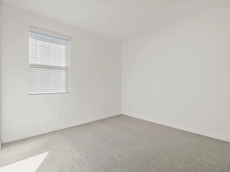 Spacious, unfurnished interior of a new home in Entrada Reserve Series, Tolleson (Image 13).