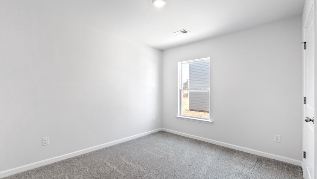 Spacious, unfurnished interior of a new home in Lightwood Cottages, Moore (Image 16).