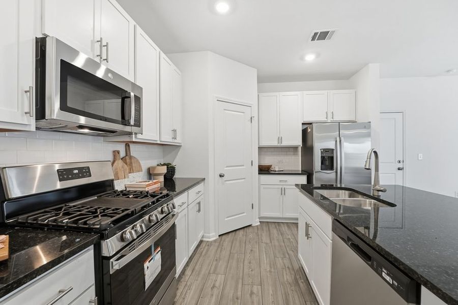 Furnished interior view inside a new home in Longview, Del Valle (Image 8).