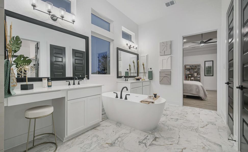 Representative furnished interior of a home built from the Adelaide by Chesmar Homes in Mesa Western, Cibolo (Image 13).