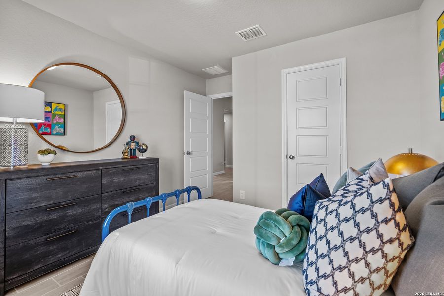 Furnished interior view inside a new home in Hunters Ranch, San Antonio (Image 30).