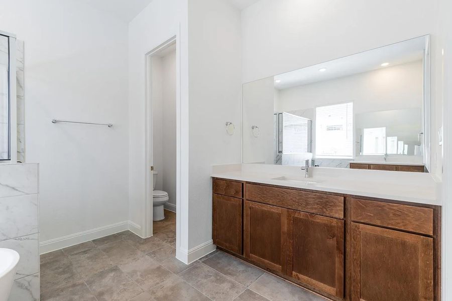 Furnished interior view inside a new home in The Colony - 50', Bastrop (Image 8).