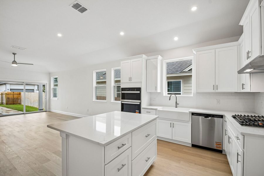 Furnished interior view inside a new home in Sage Hollow, Kyle (Image 6).