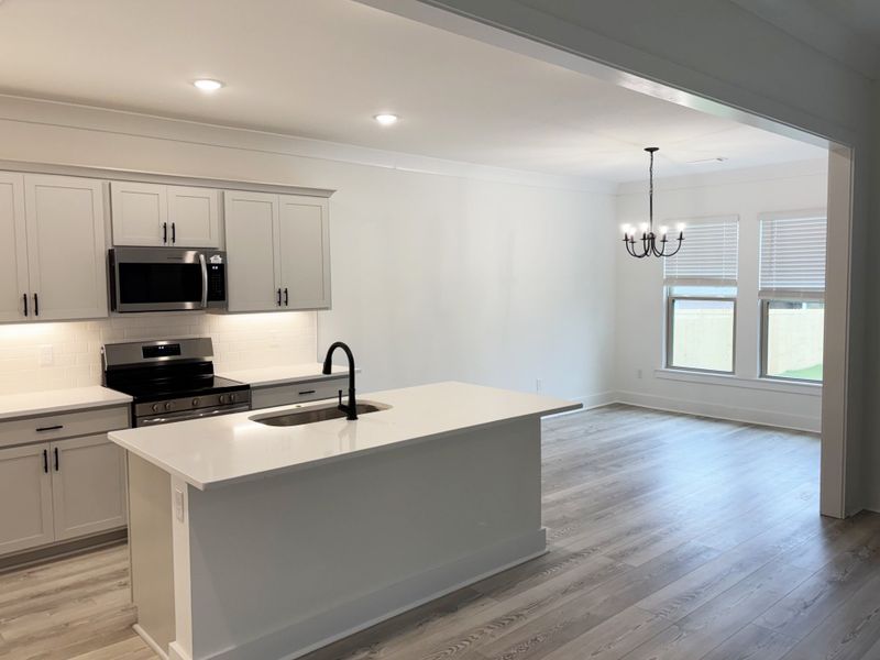 Furnished interior view inside a new home in Young Oaks, Crestview (Image 6).