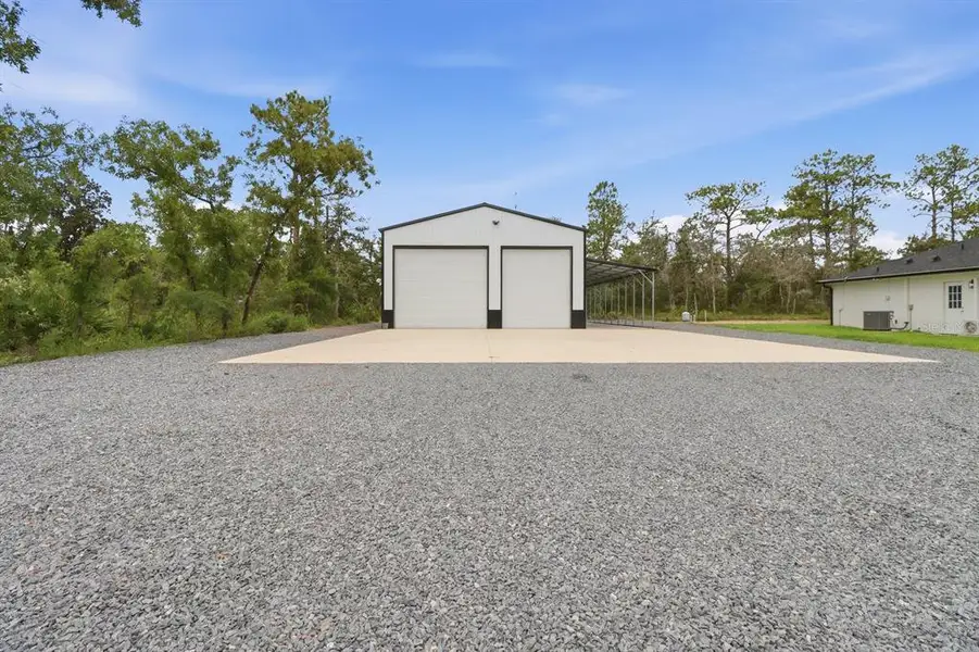 Front exterior of a new home in , Brooksville, FL, highlighting curb appeal (Image 28). Front exterior of a new home in , Brooksville, FL, highlighting curb appeal (Image 28).
