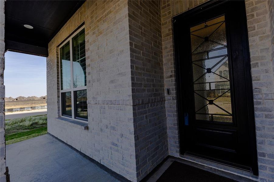 Exterior details and patio area of a home in , Aubrey (Image 3).