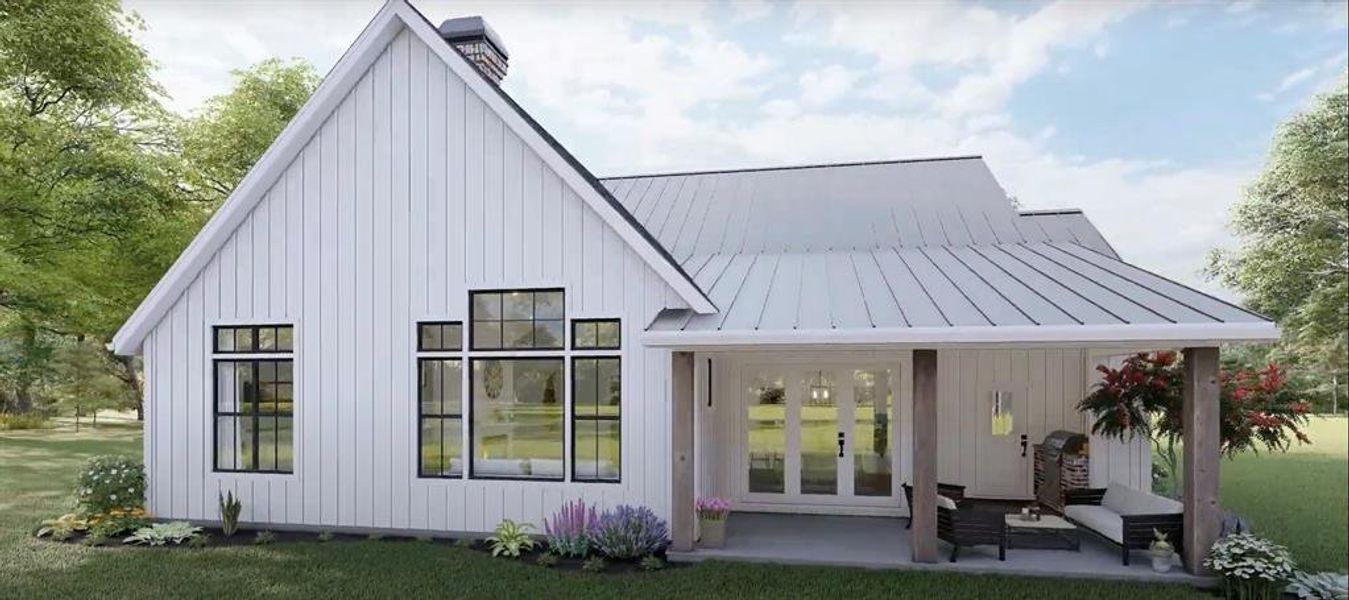 A generous back patio showcasing a built-in grill, offering a perfect setting for family and friends to enjoy outdoor meals.