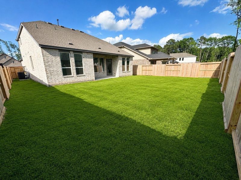 Exterior details and patio area of a home in The Highlands, Porter Heights (Image 3).
