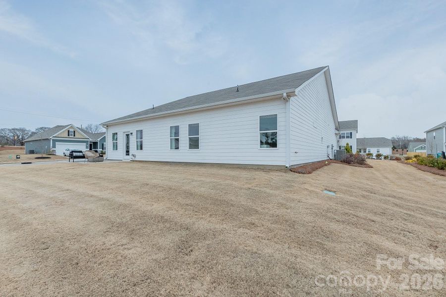 Exterior details and patio area of a home in Pine Bluff, Midland (Image 4).