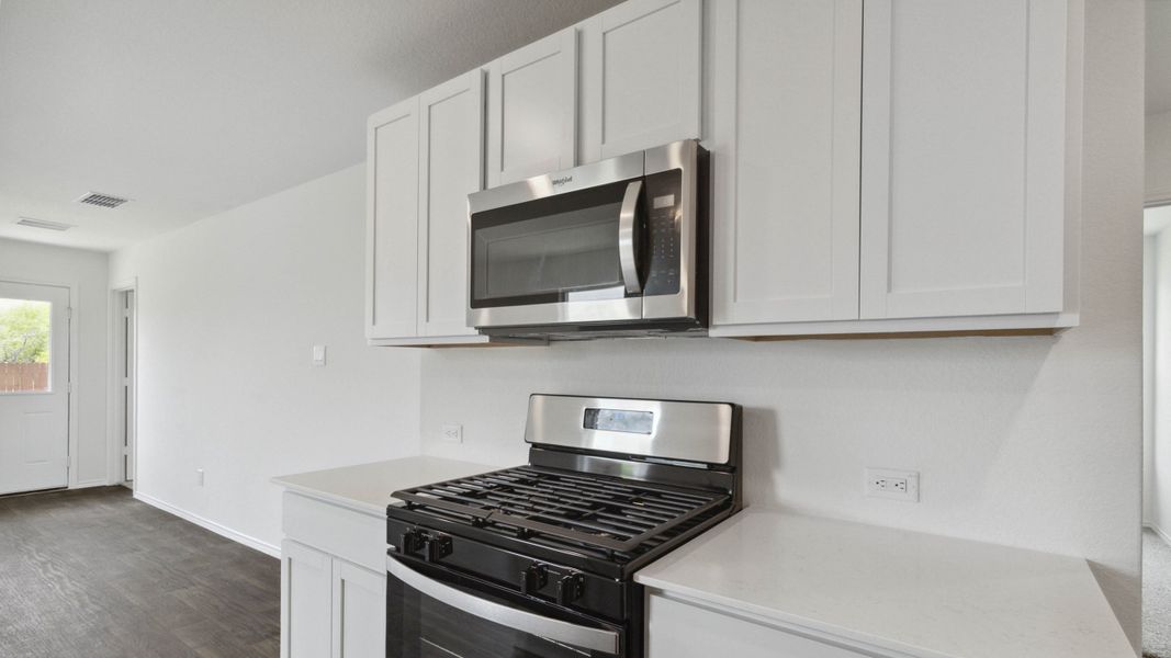 Representative furnished interior of a home built from the T30A Atlanta by D.R. Horton in Riverfield, Josephine (Image 8).