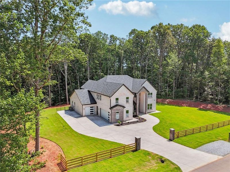 Front exterior of a new home in , Commerce, GA, highlighting curb appeal (Image 28).