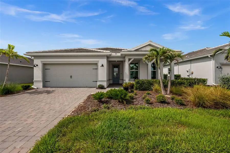 Front exterior of a new home in , Alva, FL, highlighting curb appeal (Image 2).