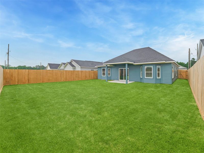 Exterior details and patio area of a home in , Splendora (Image 4).