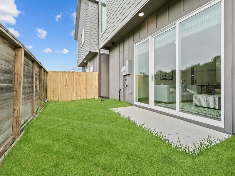 Exterior details and patio area of a home in , Houston (Image 4). Exterior details and patio area of a home in , Houston (Image 4).