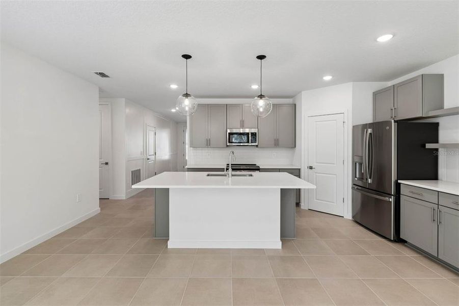 Furnished interior view inside a new home in Aspire at Canter Creek, Davenport (Image 7).