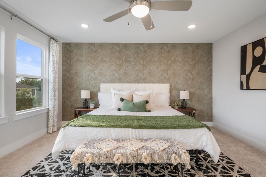 Custom wall paper in primary bedroom.