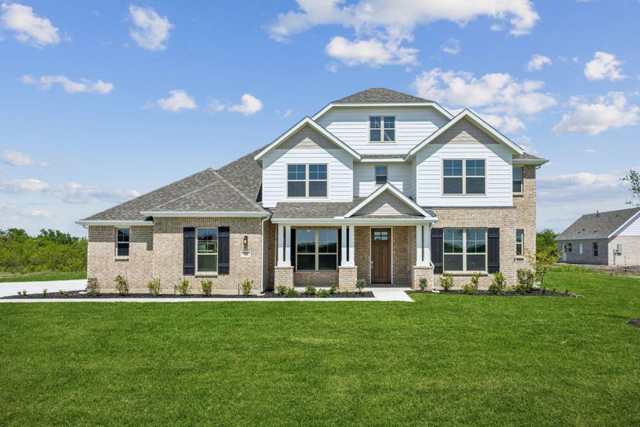 Front exterior of a new home in Ellis Ranch Estates, Waxahachie, TX, highlighting curb appeal (Image 1). Front exterior of a new home in Ellis Ranch Estates, Waxahachie, TX, highlighting curb appeal (Image 1).