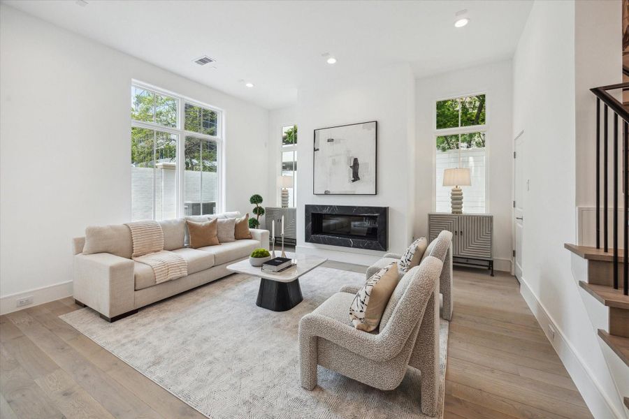 Plenty of seating available and close to French doors that lead to back yard. Plenty of seating available and close to French doors that lead to back yard.