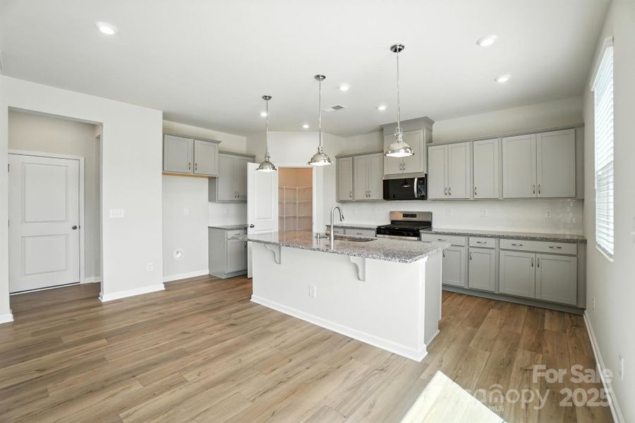 Furnished interior view inside a new home in Waxhaw Landing, Monroe (Image 5).