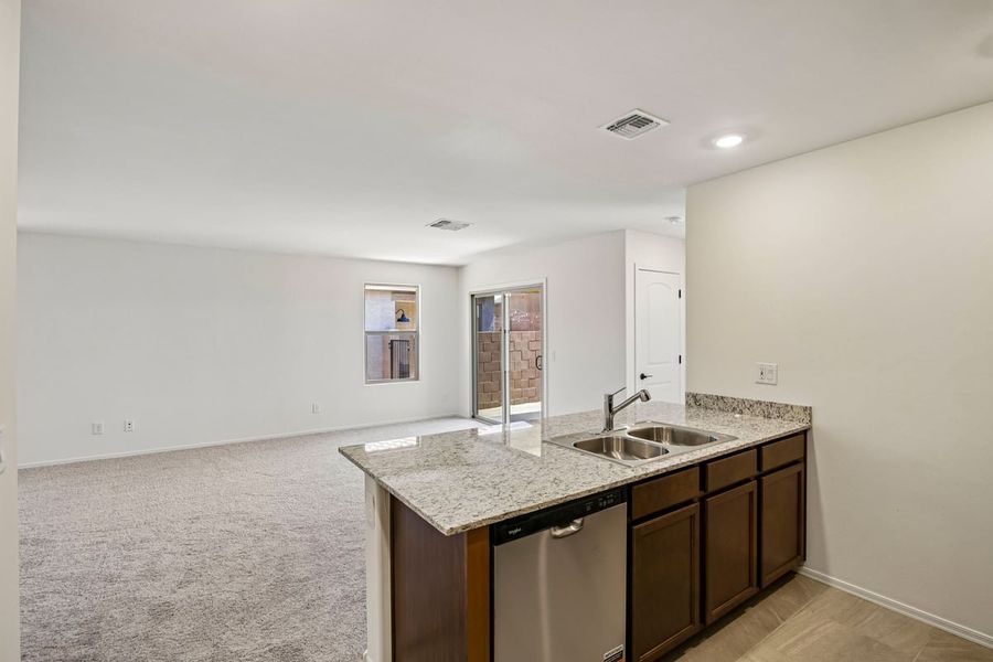 Furnished interior view inside a new home in Mandarina Reserve, Marana (Image 7). Furnished interior view inside a new home in Mandarina Reserve, Marana (Image 7).