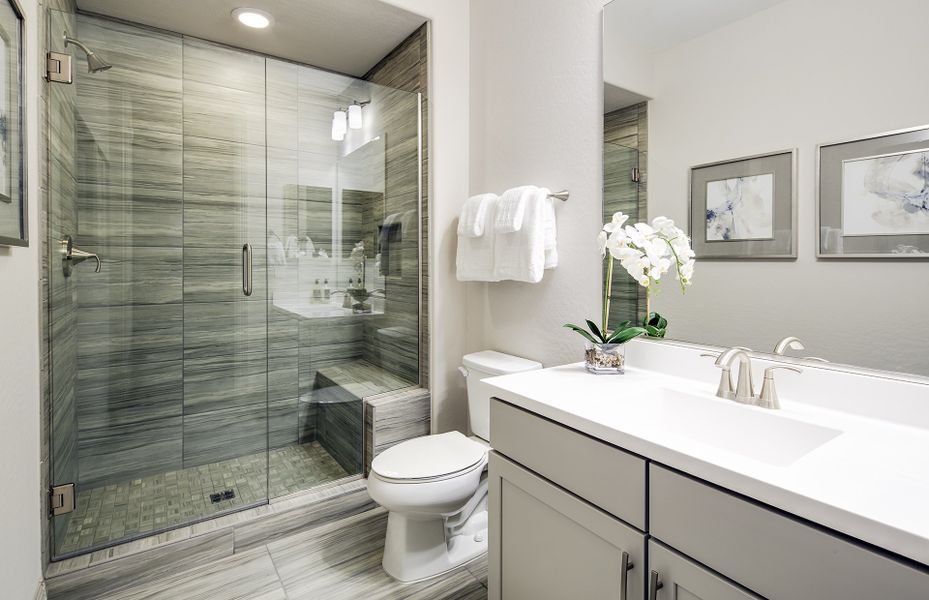 Walk-in shower with seat in secondary bath