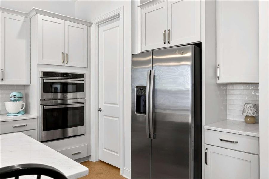 Furnished interior view inside a new home in East Harbor II at Chestatee, Dawsonville (Image 12).