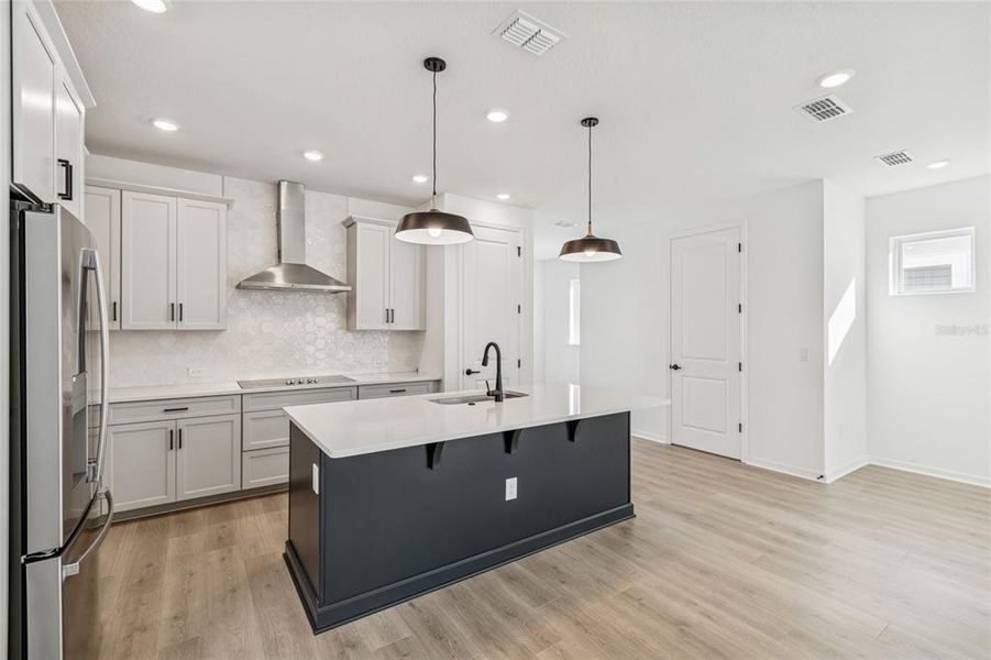 Furnished interior view inside a new home in Weslyn Park in Sunbridge 34', St. Cloud (Image 8).