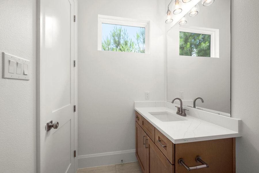 Furnished interior view inside a new home in , New Waverly (Image 12).