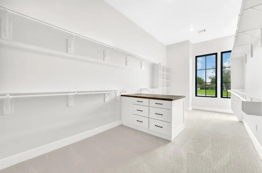 2 separate primary closets w/ an extra potential third closet.